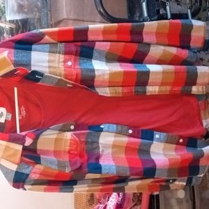 A flannel shirt with a another shirt that matches it